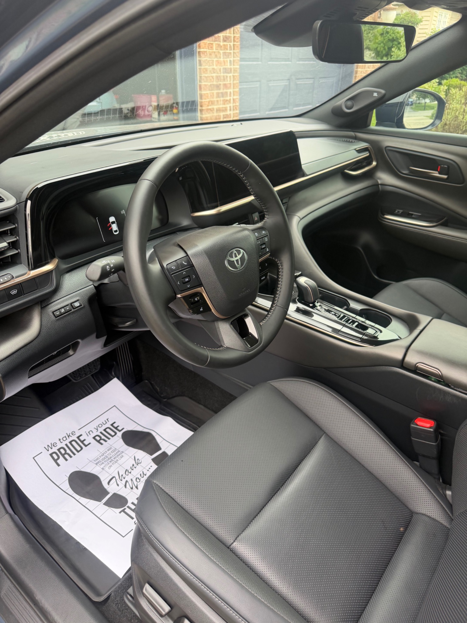 Clean Toyota interior with black seats and dashboard