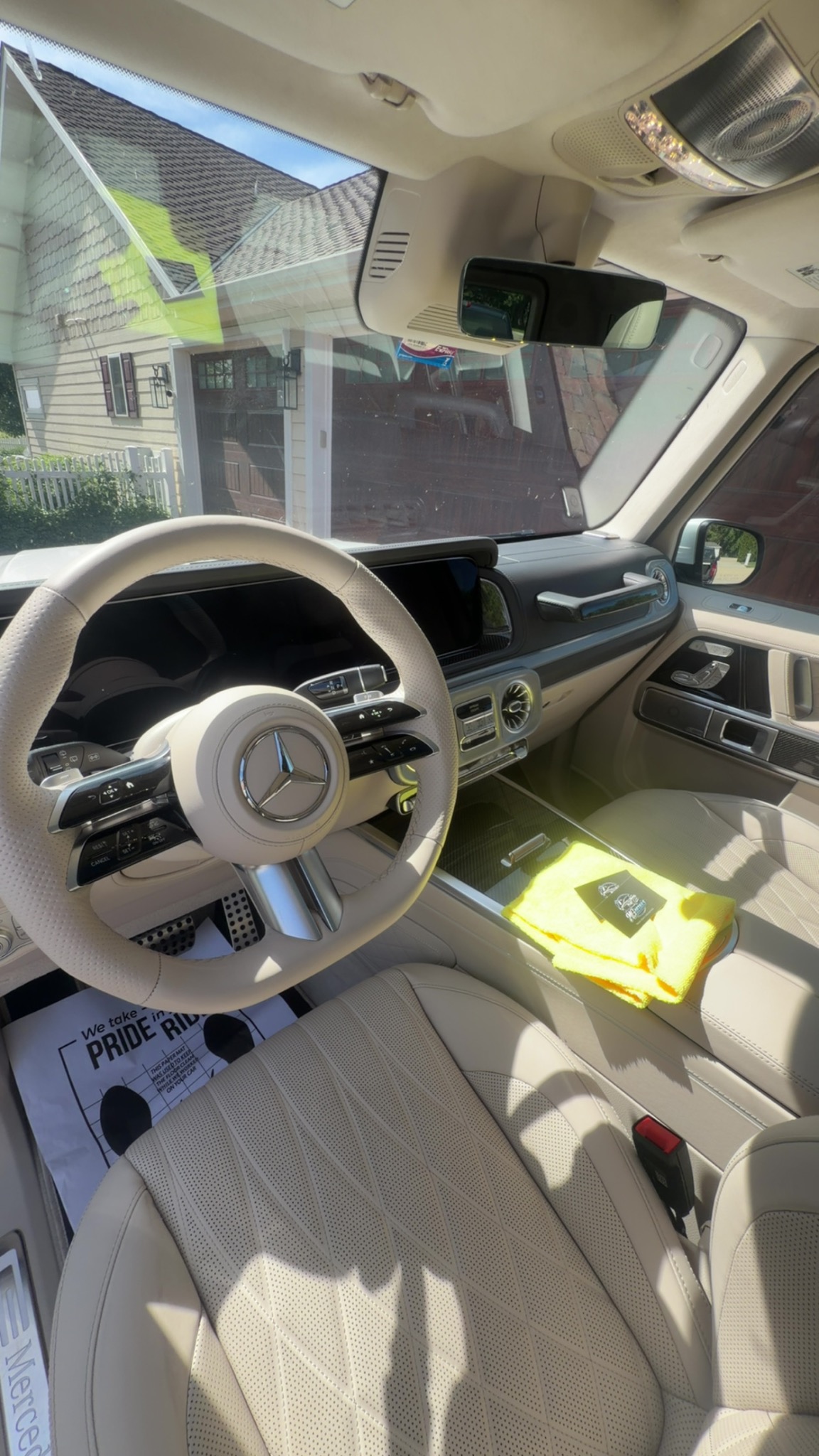 Detailed Mercedes interior with cream leather seats